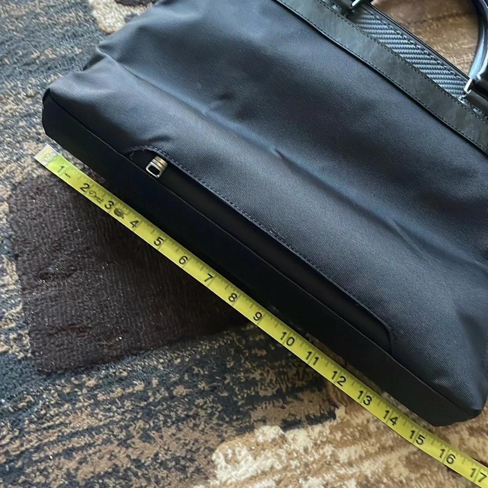 Tumi Canvas Black Laptop Bag with Carbon Fiber Accents